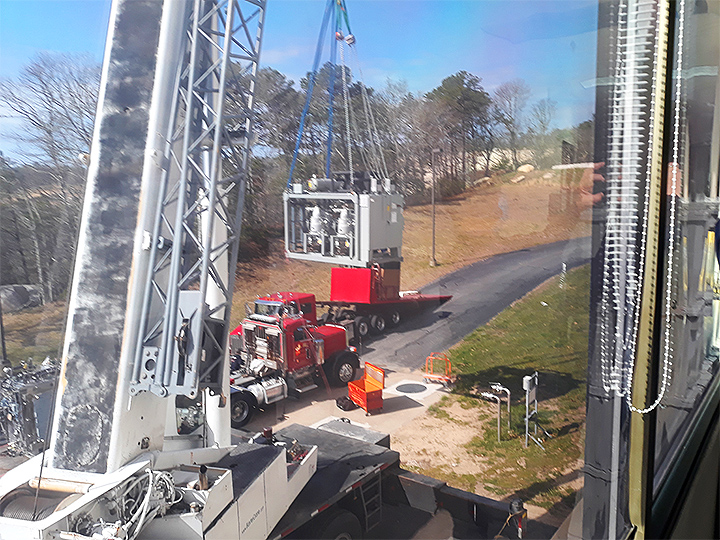 Our 210 Ton crane working with OB Hill to rig a new MRI machine into a new facility in Falmouth, MA